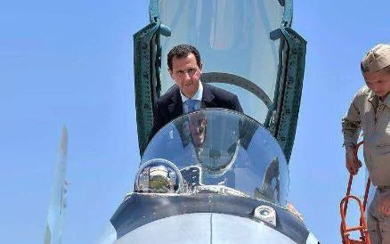 Ông Assad cưỡi chiến đấu cơ SU-35 tại căn cứ không quân Nga - Ảnh 1.