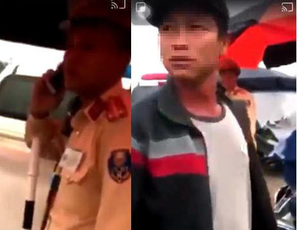 Vụ người dân ghi hình tại chốt CSGT bị hành hung: Xác định người lạ mặt cầm bộ đàm - Ảnh 2.