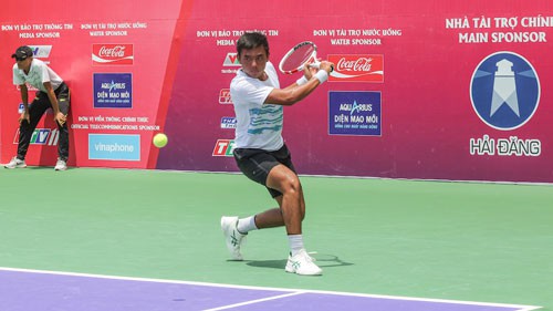 Lý Hoàng Nam vào tứ kết ITF World Tennis Tour M25 - Ảnh 1.