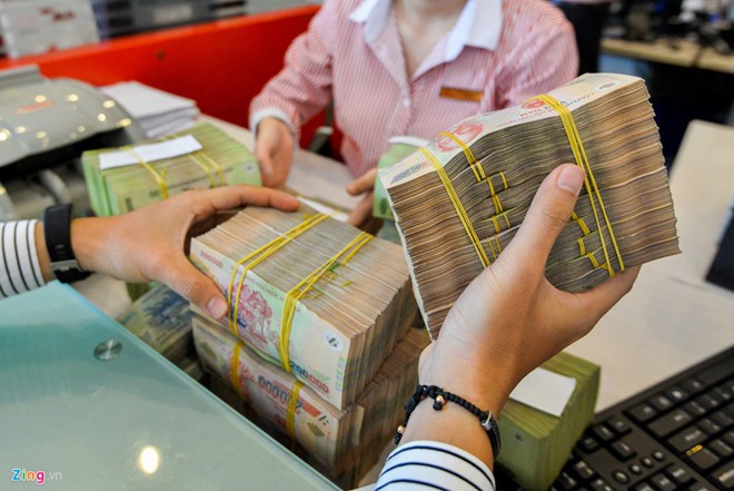 Xài tiền thưởng Tết như thế nào là hợp lý? - Ảnh 1.