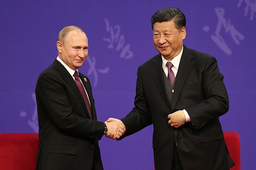 Mỹ đẩy Nga và Trung Quốc xích lại gần nhau hơn - Ảnh 1.