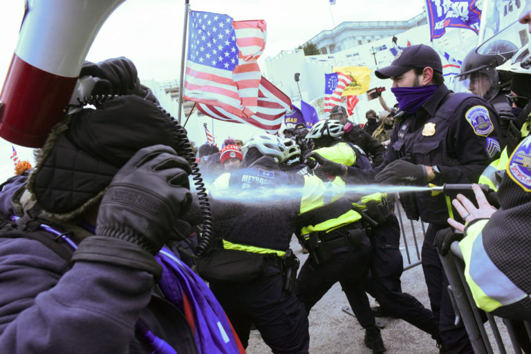 Do the rioters support or oppose President Trump?  - Photo 2.