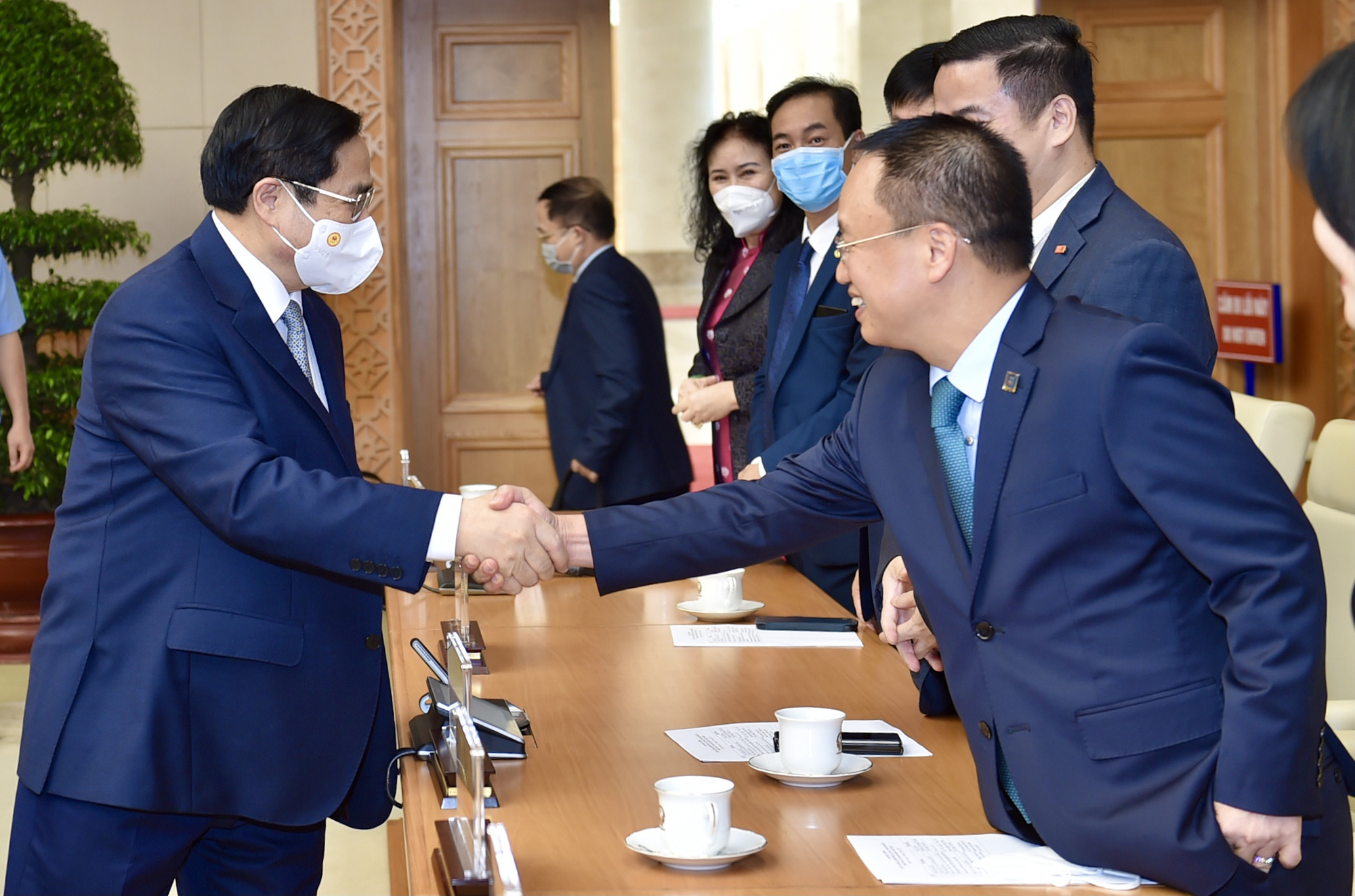 Thủ tướng Phạm Minh Chính gặp mặt doanh nhân - Ảnh 1.