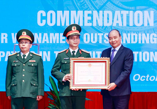 Chủ tịch nước tuyên dương chiến sĩ mũ nồi xanh Việt Nam - Ảnh 1.