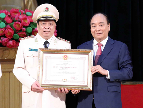Học viện An ninh Nhân dân nhận Huân chương Chiến công hạng nhất - Ảnh 1.