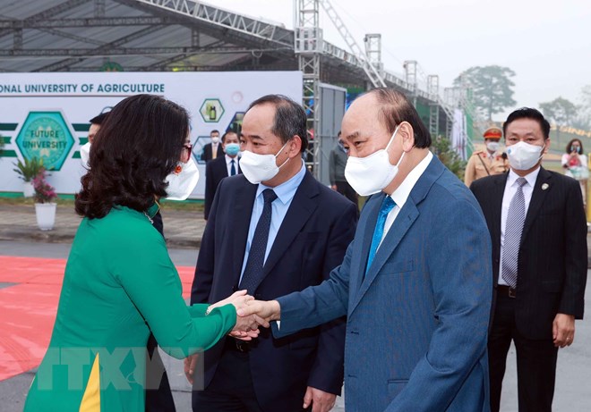 Chủ tịch nước Nguyễn Xuân Phúc: Quan tâm đầu tư, bồi dưỡng đội ngũ cán bộ, giảng viên - Ảnh 1. Chủ tịch nước Nguyễn Xuân Phúc: Quan tâm đầu tư, bồi dưỡng đội ngũ cán bộ, giảng viên - Ảnh 1.