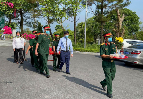 Quảng Trị: An táng 24 hài cốt liệt sĩ hy sinh tại Lào - Ảnh 1.