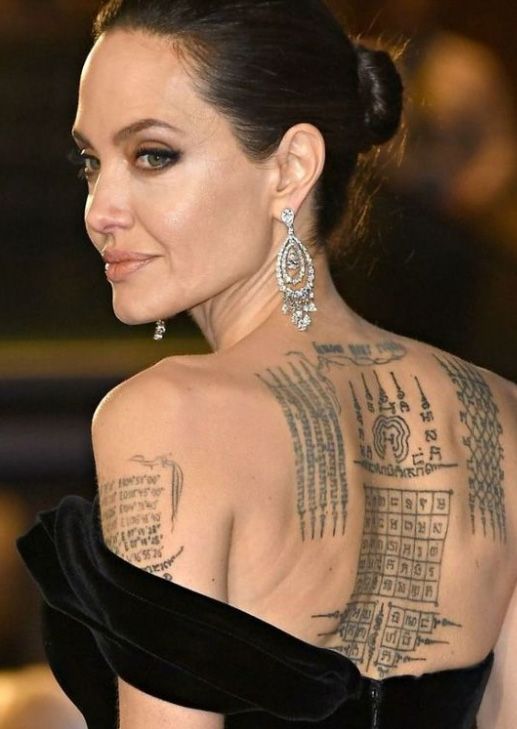 Báo giải trí phương Tây tung hình xăm mới của Angelina Jolie - Ảnh 4.