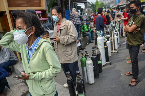 Indonesia và Thái Lan ngóng chờ vắc-xin Covid-19 - Ảnh 1.