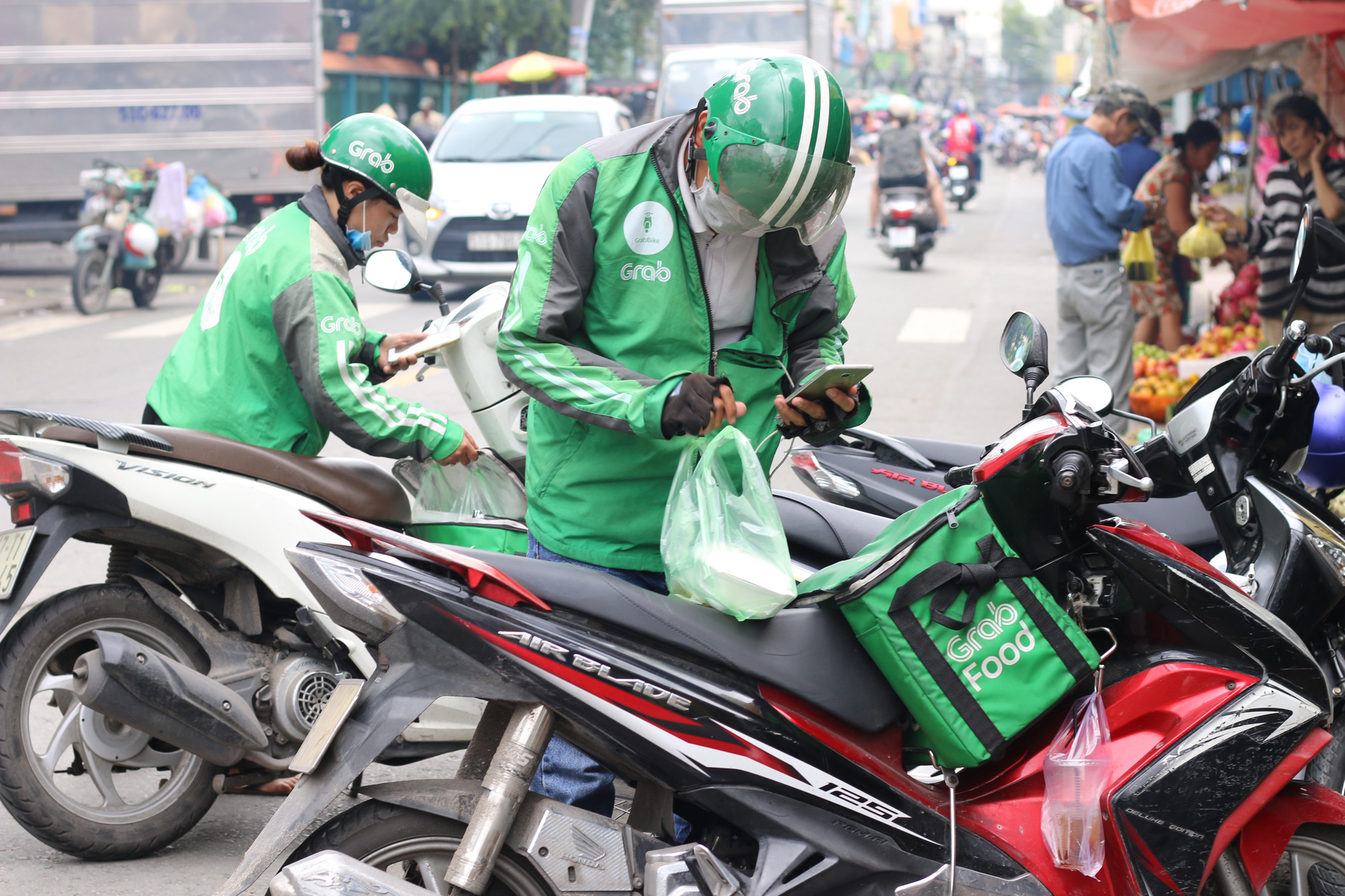 Thành phố Hồ Chí Minh dự kiến mở rộng hỗ trợ đối tượng lao động tự do gặp khó khăn - Ảnh 2.