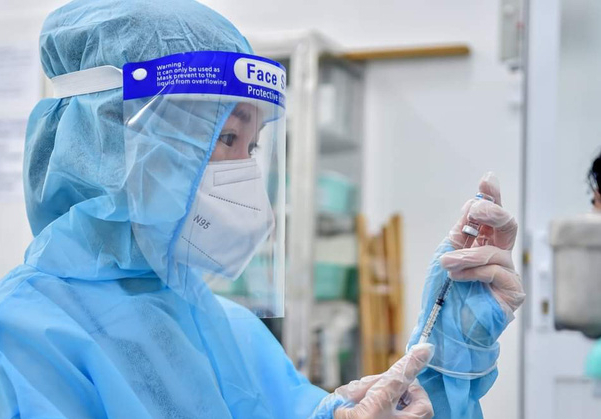 TP HCM tổ chức tiêm vắc-xin phòng Covid-19 xuyên Tết Nguyên đán 2022 - Ảnh 1.