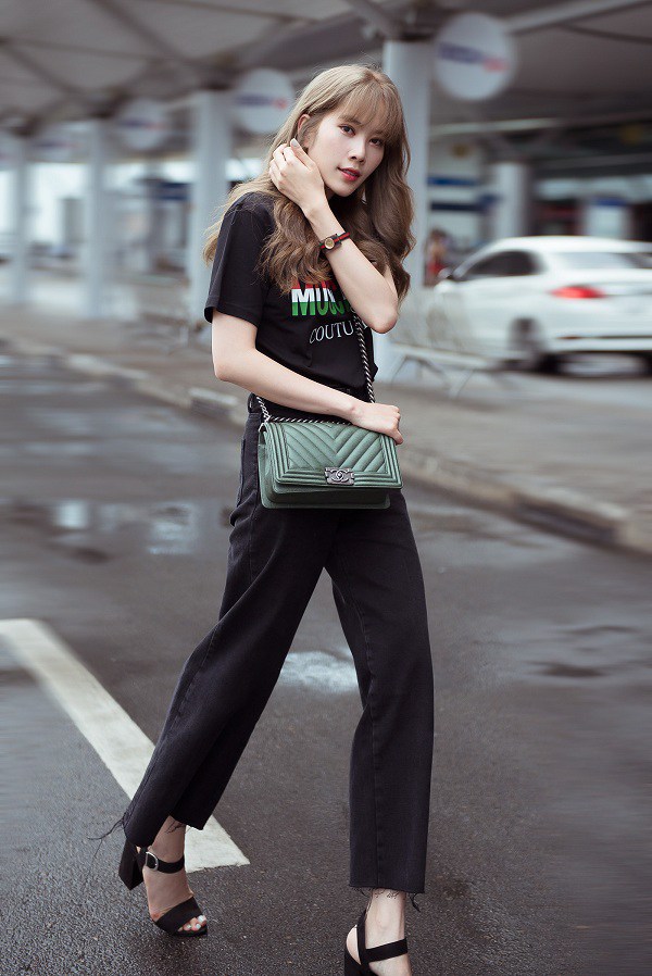 7 cách phối đồ kéo chân dài với quần jeans đen - Ảnh 1.