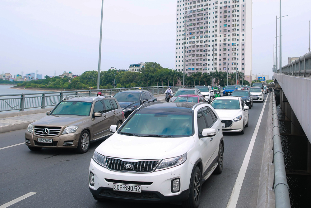 Người dân trở lại Thủ đô, cửa ngõ phía Nam ùn tắc hàng km - Ảnh 6.