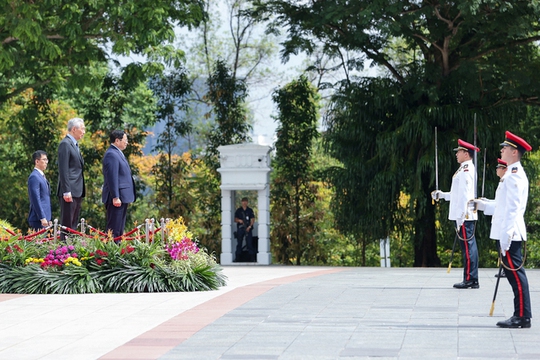 Lễ đón Thủ tướng Phạm Minh Chính thăm chính thức Singapore - Ảnh 2.