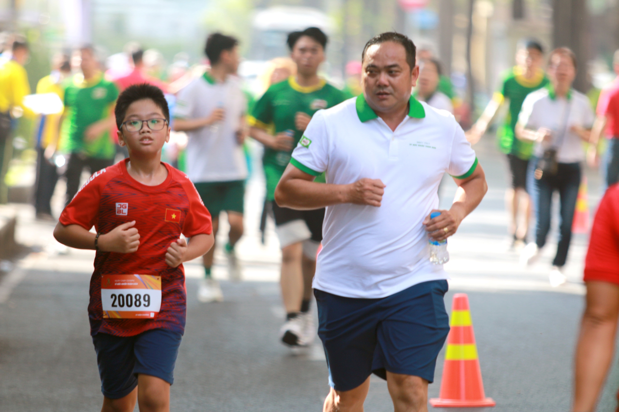 Ngày chạy Olympic TP HCM: 10.000 người nô nức xuống phố - Ảnh 4.