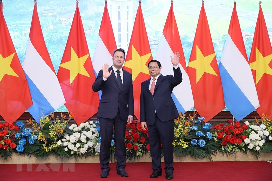 Thủ tướng Phạm Minh Chính đón, hội đàm với Thủ tướng Luxembourg - Ảnh 12.