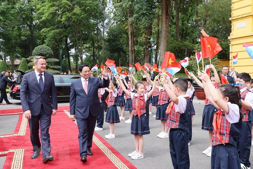 Thủ tướng Phạm Minh Chính đón, hội đàm với Thủ tướng Luxembourg - Ảnh 6.