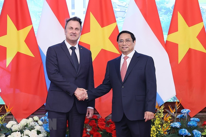 Thủ tướng Phạm Minh Chính đón, hội đàm với Thủ tướng Luxembourg - Ảnh 11.
