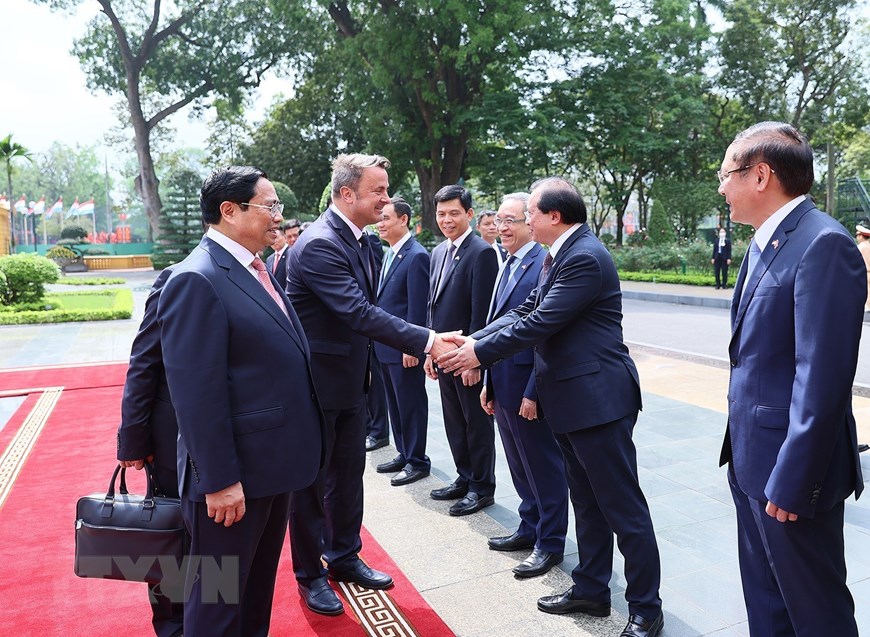 Thủ tướng Phạm Minh Chính đón, hội đàm với Thủ tướng Luxembourg - Ảnh 10.