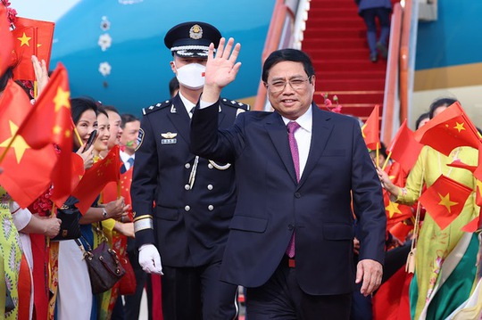 Thủ tướng Phạm Minh Chính tới Bắc Kinh, bắt đầu thăm chính thức Trung Quốc - Ảnh 1.
