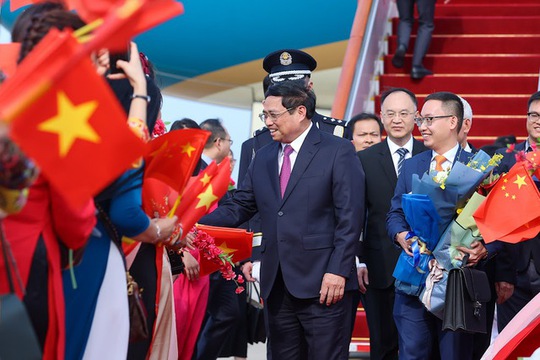 Thủ tướng Phạm Minh Chính tới Bắc Kinh, bắt đầu thăm chính thức Trung Quốc - Ảnh 7.