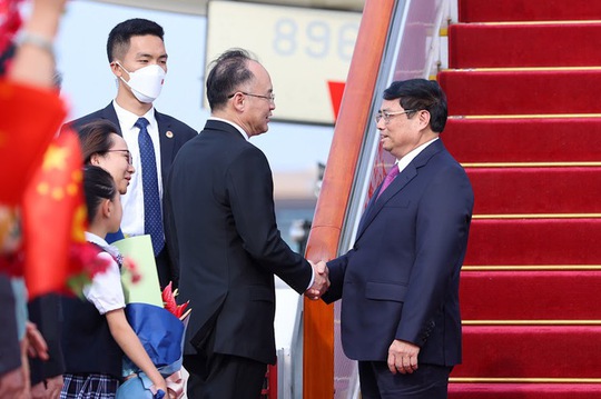 Thủ tướng Phạm Minh Chính tới Bắc Kinh, bắt đầu thăm chính thức Trung Quốc - Ảnh 4.