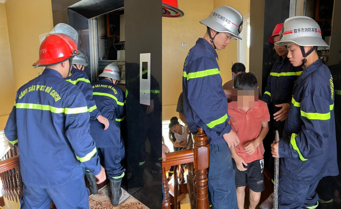 Giải cứu bé trai 11 tuổi mắc kẹt trong thang máy - Ảnh 1.