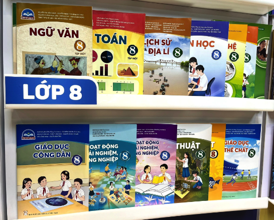 Bộ trưởng Nguyễn Kim Sơn nói gì về việc chi 100 tỉ phát triển thị trường và tập huấn SGK? - Ảnh 3.