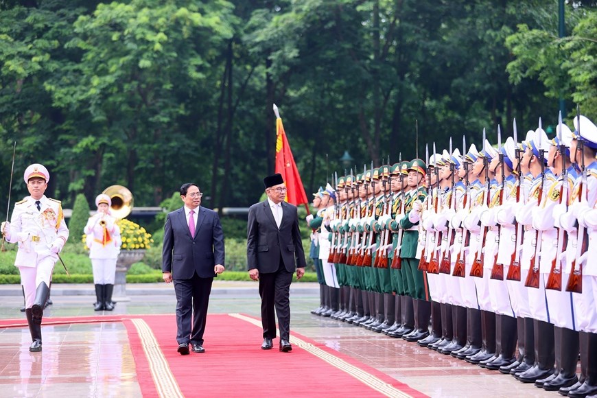 Thủ tướng Phạm Minh Chính đón, hội đàm với Thủ tướng Malaysia - Ảnh 6.
