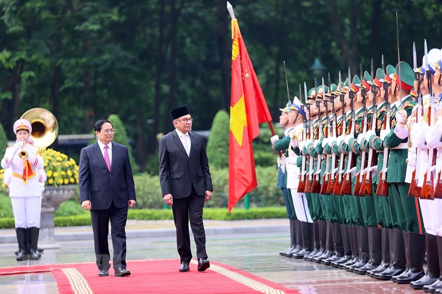 Thủ tướng Phạm Minh Chính đón, hội đàm với Thủ tướng Malaysia - Ảnh 7.