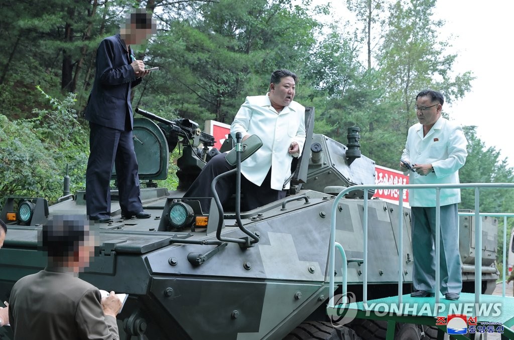North Korean leader drives an armored vehicle - photo 1. North Korean leader drives an armored vehicle - photo 1.