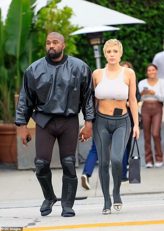 Mặc lố lăng, vợ chồng Kanye West liên tục gặp rắc rối - Ảnh 8.