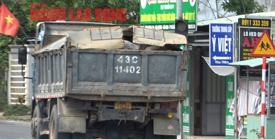 Bất an với đoàn xe tải tung hoành trên quốc lộ ở Đà Nẵng - Ảnh 1.