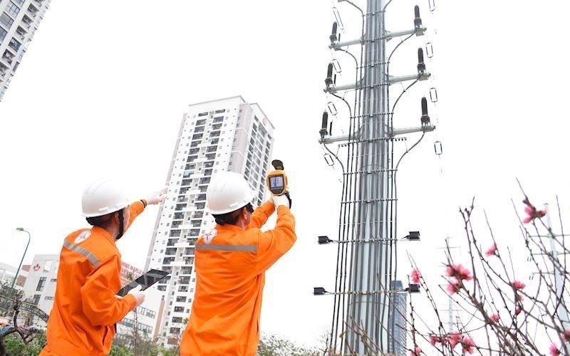 EVN hết lỗ lũy kế và ghi nhận lợi nhuận cao kỷ lục năm 2025 - Ảnh 2. EVN hết lỗ lũy kế và ghi nhận lợi nhuận cao kỷ lục năm 2025 - Ảnh 2.