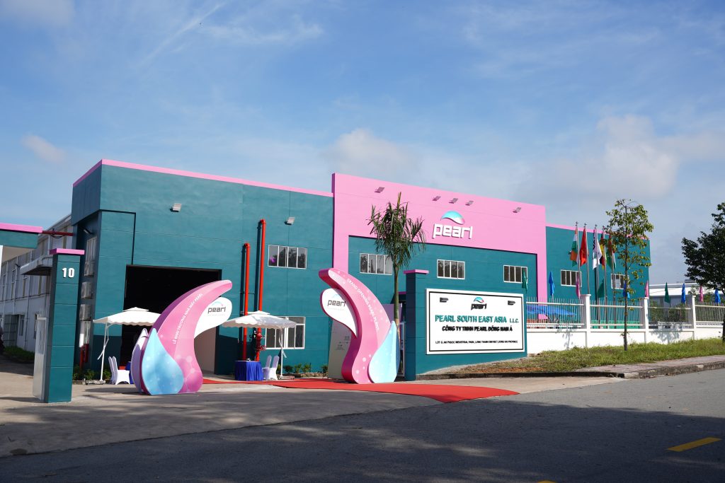 A building with pink and blue paint  Description automatically generated