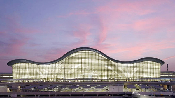 Sân bay quốc tế Zayed ở UAE có kiến trúc tựa như cồn cát- Ảnh 1.