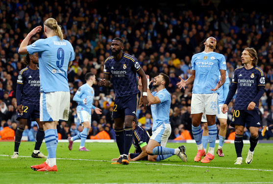 Man City trở thành cựu vô địch sau trận thua Real Madrid ở “chung kết sớm” Ảnh: REUTERS