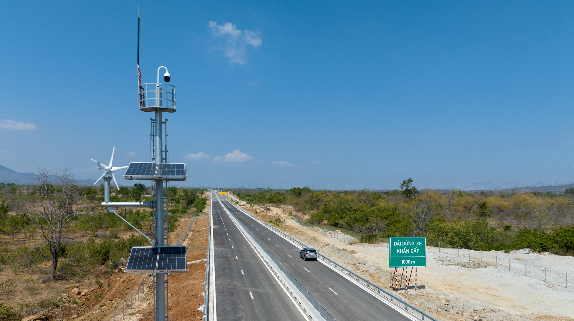 A road with a solar panel on it  Description automatically generated