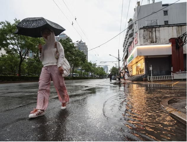 Mưa lớn có thể kéo dài suốt tuần ở Trung Quốc. Ảnh: EPA