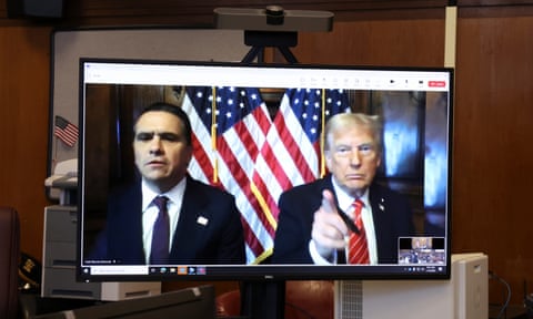 two men on a computer screen in a courtroom