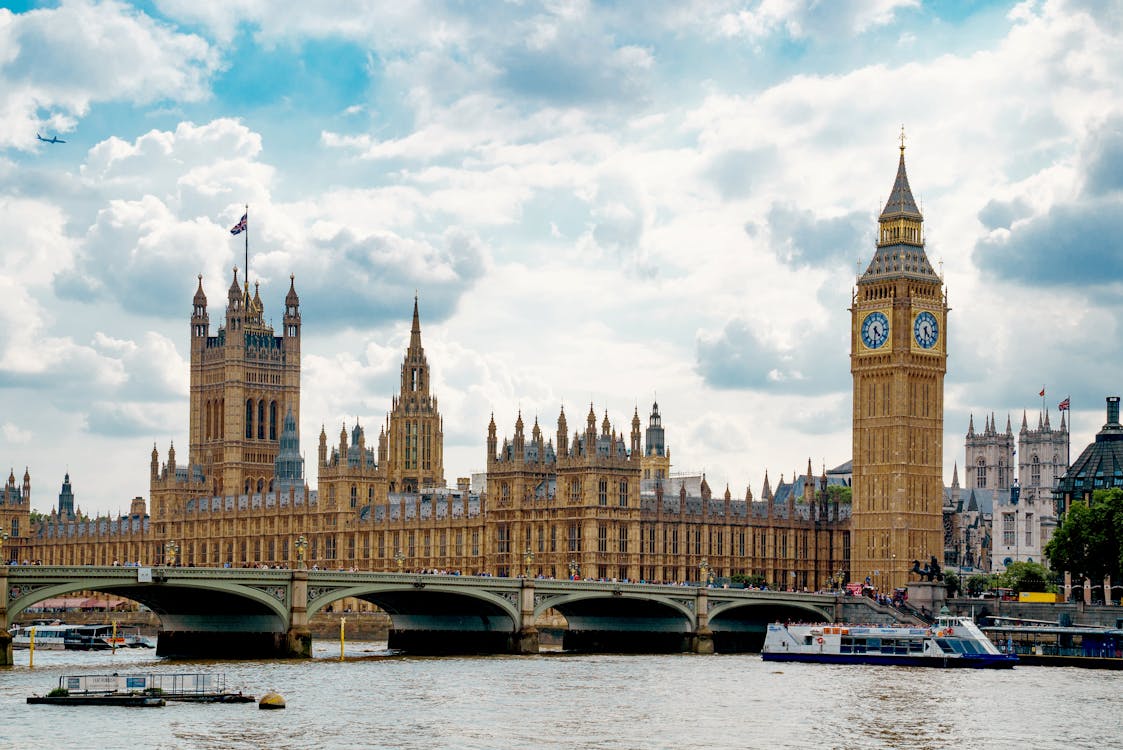 Free Stunning view of London's Big Ben and Houses of Parliament from the River Thames. Stock Photo