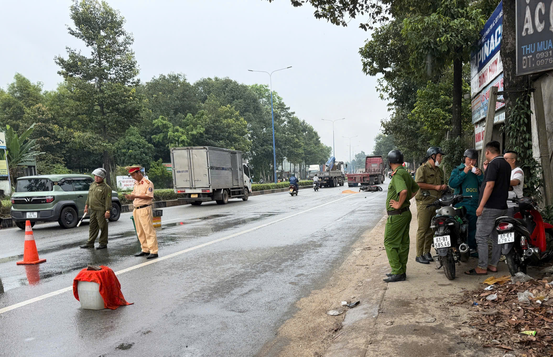 Tai nạn thương tâm trên đường Mỹ Phước - Tân Vạn khiến một người phụ nữ tử vong - Ảnh 4.