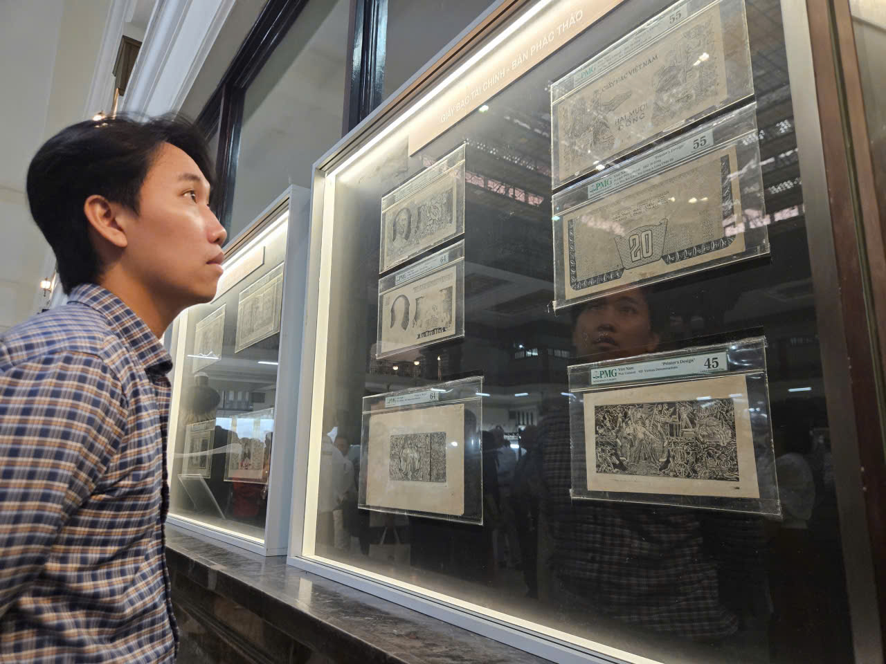 हो ची मिन्ह सिटी में वियतनामी सिक्कों की प्रदर्शनी राष्ट्रीय इतिहास की यात्रा को दर्शाती है - फोटो 8. Triển lãm Đồng tiền Việt Nam tại TP HCM khám phá Hành trình lịch sử dân tộc - Ảnh 8.