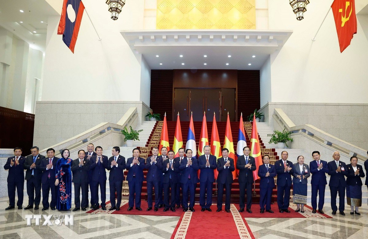 Cuộc gặp cấp cao giữa Đảng Cộng sản Việt Nam và Đảng Nhân dân Cách mạng Lào - Ảnh 7.