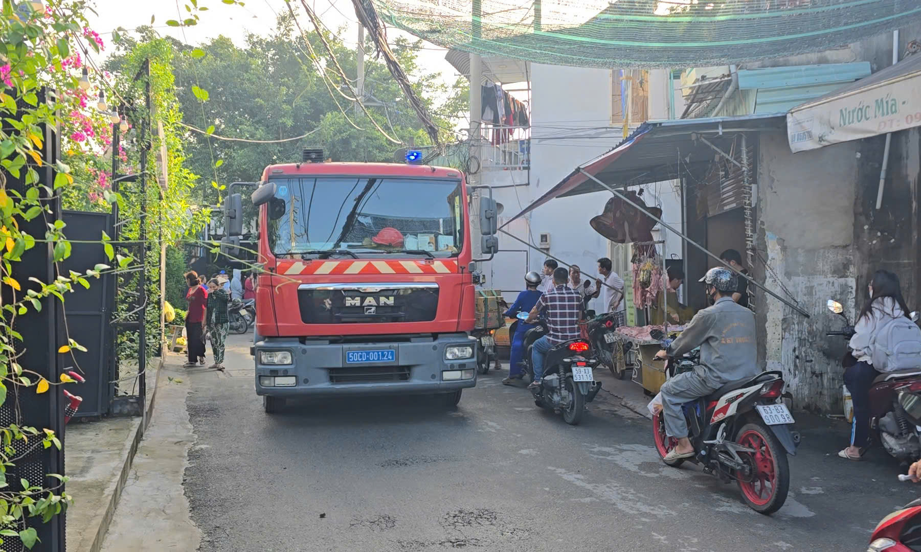 Vụ cháy nhà 1 người chết ở TPHCM: Nạn nhân đi mua một can xăng - Ảnh 1.