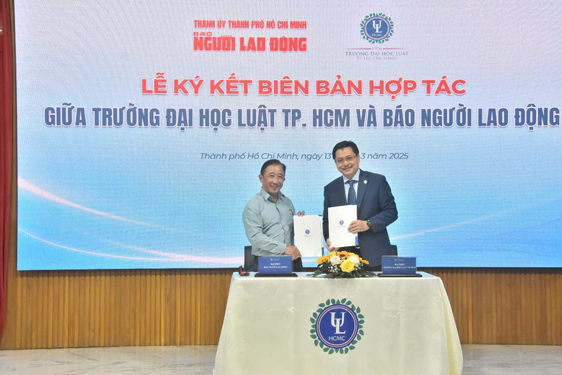 Báo Người Lao Động và Trường ĐH Luật TP HCM ký kết hợp tác toàn diện  Ảnh: TẤN THẠNH