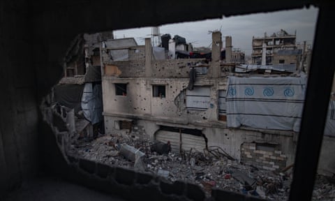 Palestinians among the rubble of destroyed buildings during the holy month of Ramadan