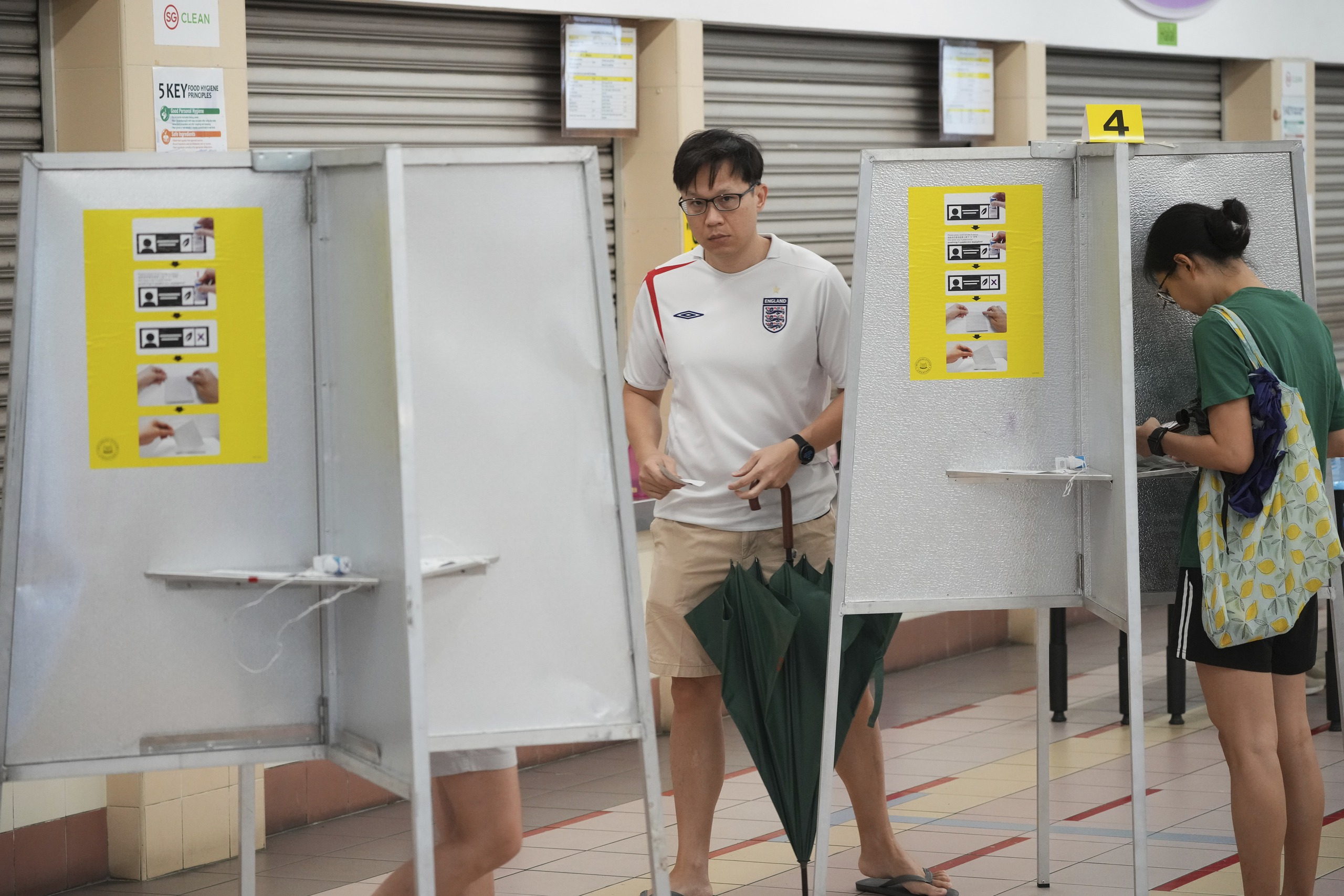 Cử tri Singapore, Úc lên tiếng trong tổng tuyển cử- Ảnh 1. Cử tri Singapore, Úc lên tiếng trong tổng tuyển cử- Ảnh 1.