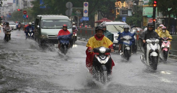 Mưa lớn sẽ còn kéo dài ở TP HCM và Nam Bộ- Ảnh 1.