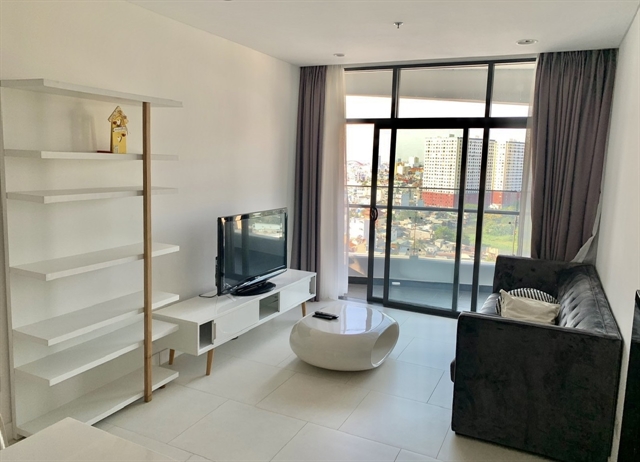 HCM City proposes pilot scheme for short-term rentals in apartments - Ảnh 1.